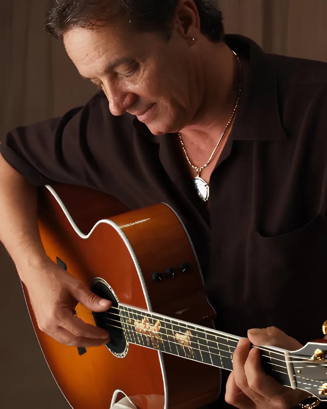 Sir C.W. Colt playing acoustic guitar